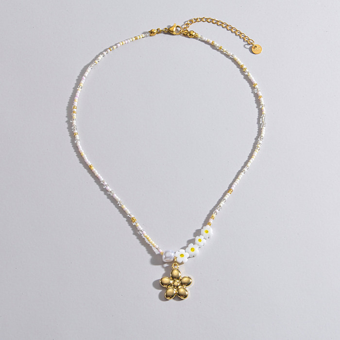 Collier pendentif plaqué or 18 carats avec perles en acier inoxydable à fleur brillante