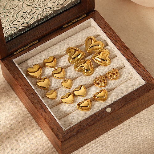 1 par de pendientes colgantes chapados en oro de 18 quilates de acero inoxidable pulido con forma de corazón de estilo clásico