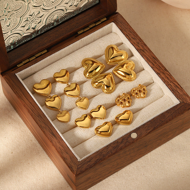 1 par estilo clássico formato de coração polimento chapeamento aço inoxidável 18K brincos banhados a ouro