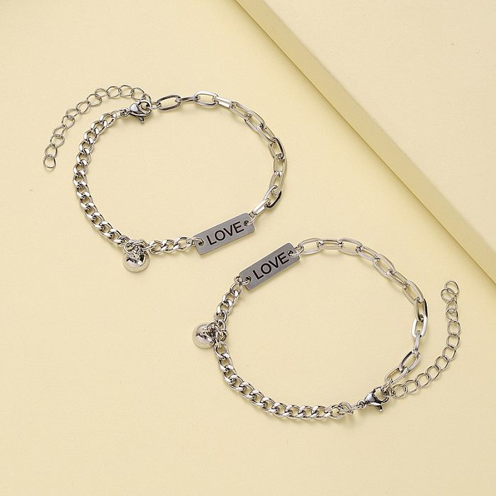 1 paire de bracelets faits à la main en acier inoxydable avec lettres à la mode