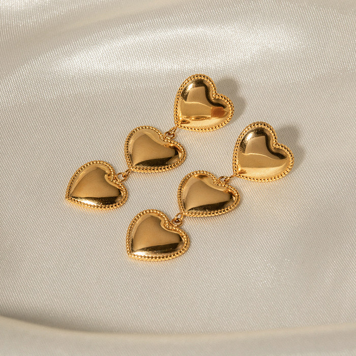 1 par de pendientes colgantes chapados en oro de 18K chapados en acero inoxidable con forma de corazón estilo INS