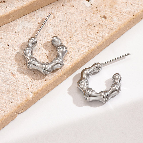 1 paire de clous d'oreilles plaqués or 14 carats, style moderne et simple, en forme de C, en acier inoxydable