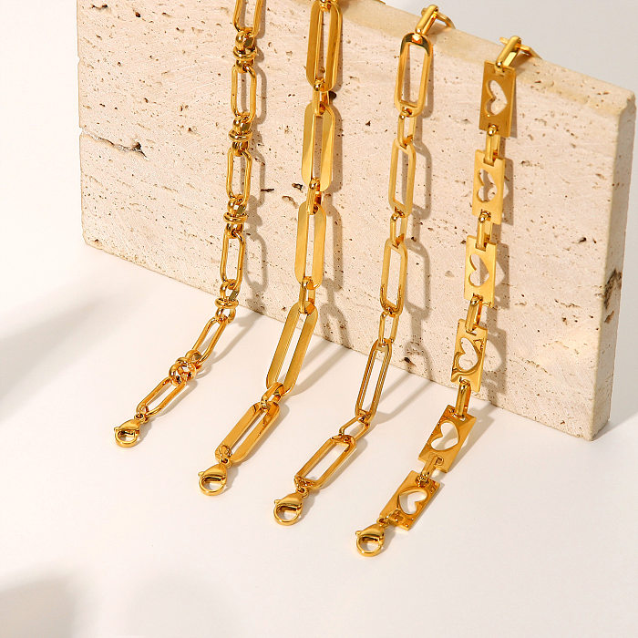 Bracelet en acier inoxydable plaqué or 18 carats avec chaîne creuse simple et boucle croisée
