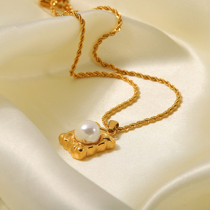 Elegante geometrische Edelstahl-Halskette mit vergoldeten künstlichen Perlen