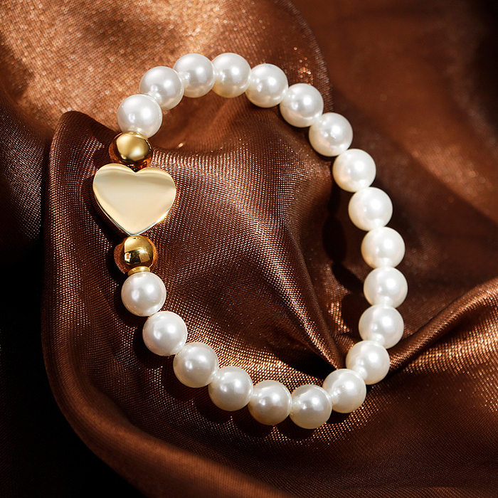 Rueda de tarjeta coreano nuevo Shell pulsera de perlas amor pulsera de acero inoxidable estilo creativo pulsera de mujer al por mayor