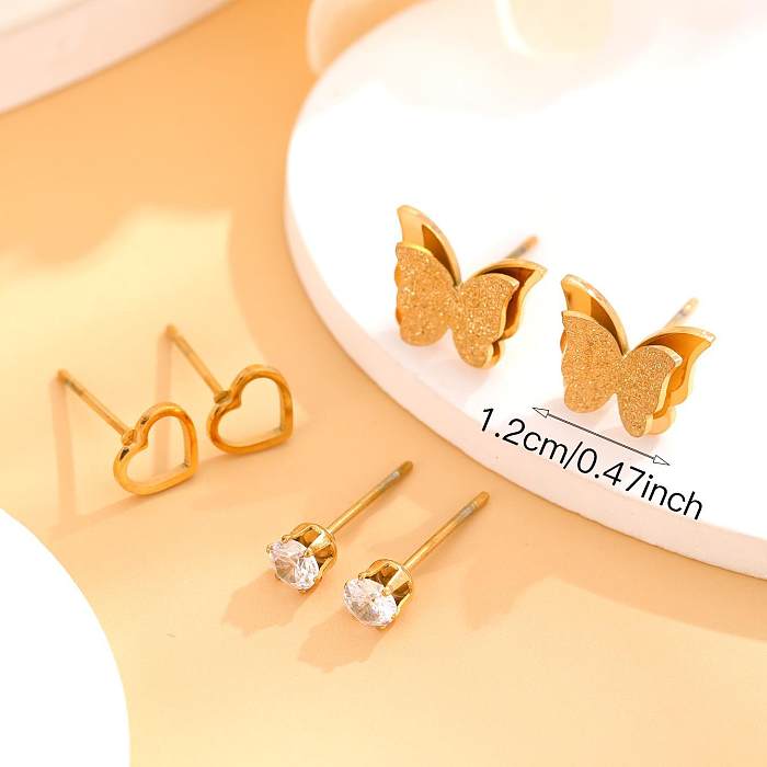 1 Juego de pendientes chapados en oro con incrustaciones de mariposa en forma de corazón y estrella de estilo clásico informal con diamantes de imitación de acero inoxidable y circonita