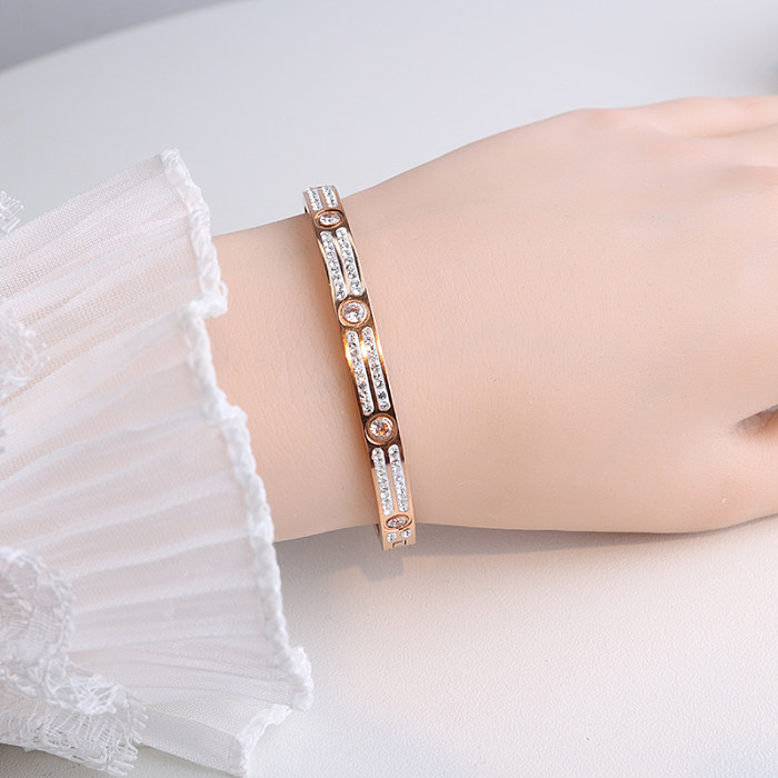 Bracelet plaqué or 18 carats avec incrustation de strass en acier inoxydable de couleur unie de style simple