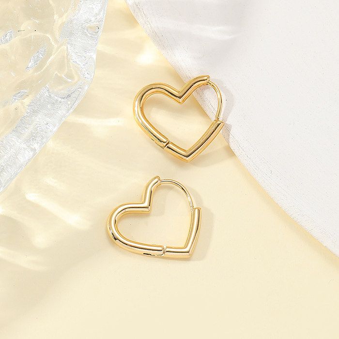1 par casual estilo simples formato de coração chapeado brincos banhados a ouro 18K de aço inoxidável