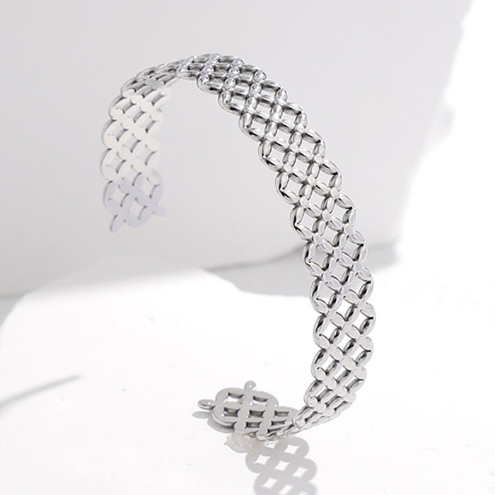 Brazalete con revestimiento de acero y titanio Fashion Grid, 1 pieza