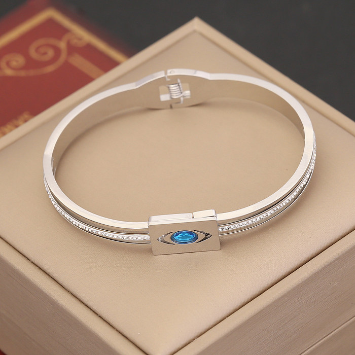 Bracelet en diamant artificiel avec incrustation de placage en acier inoxydable en forme de coeur d'oeil du diable de Style Simple