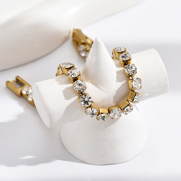 Luxuriöse geometrische Edelstahl-Intarsien mit künstlichen Strasssteinen, 14 Karat vergoldete Armbänder