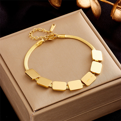 Bracelets plaqués or 18 carats en acier titane de couleur unie de style simple, vente en gros