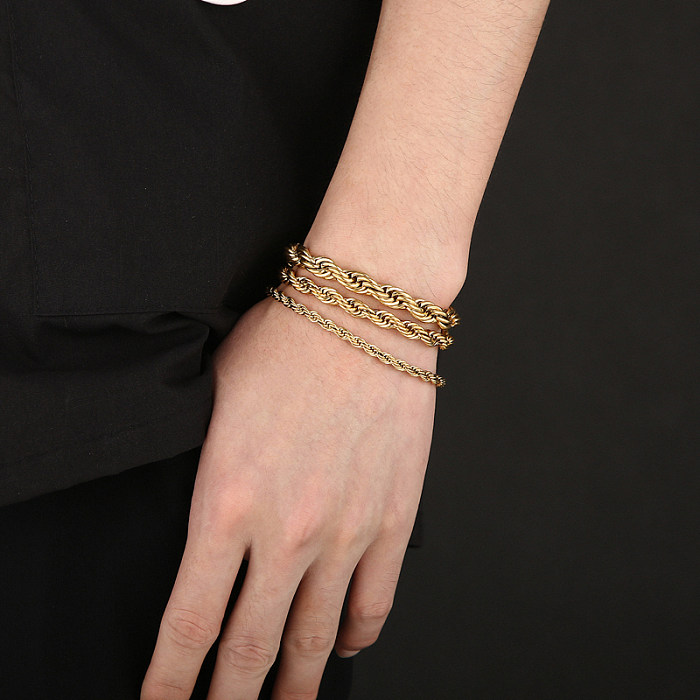 Einfache Twist-Armbänder aus Edelstahl mit 18-Karat-Vergoldung