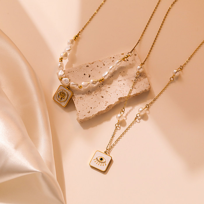 Collier pendentif plaqué or 18 carats avec incrustation de placage en acier inoxydable pour œil de trajet de style simple