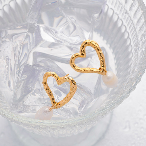1 par de brincos de gota banhados a ouro 18K em formato de coração estilo simples