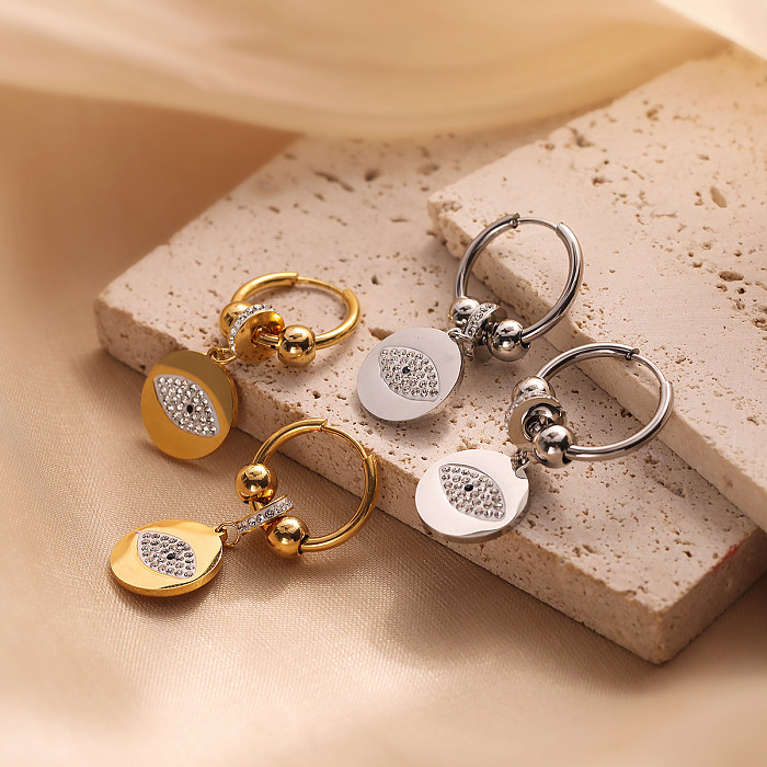 1 Paar lässige, schlichte, runde Teufelsaugen-Beschichtungs-Inlay-Ohrringe aus Edelstahl mit Zirkon und 18 Karat Gold