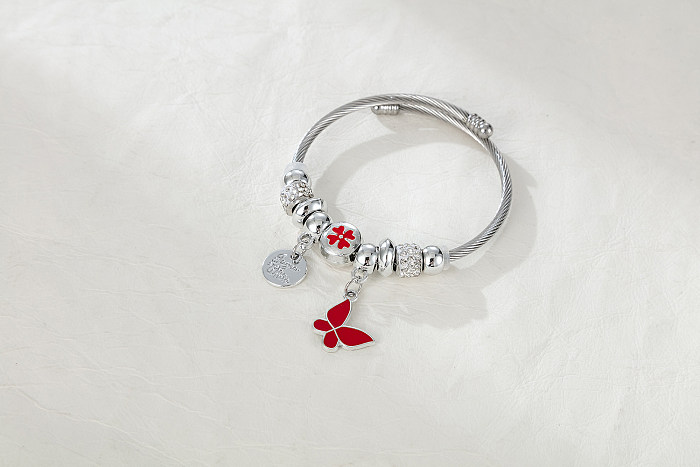 Elegante trevo de quatro folhas redondo borboleta chapeamento de aço inoxidável inlay zircão pulseira banhada a prata