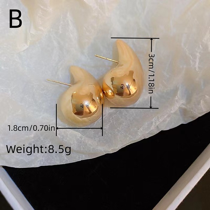 1 paire de clous d'oreilles décontractés en acier inoxydable plaqué or et argent, couleur unie