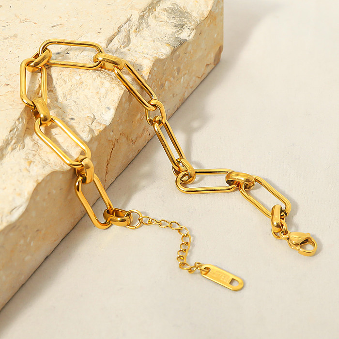 Großhandel mit schlichten, geometrischen Titanstahl-Armbändern mit 18-Karat-Vergoldung