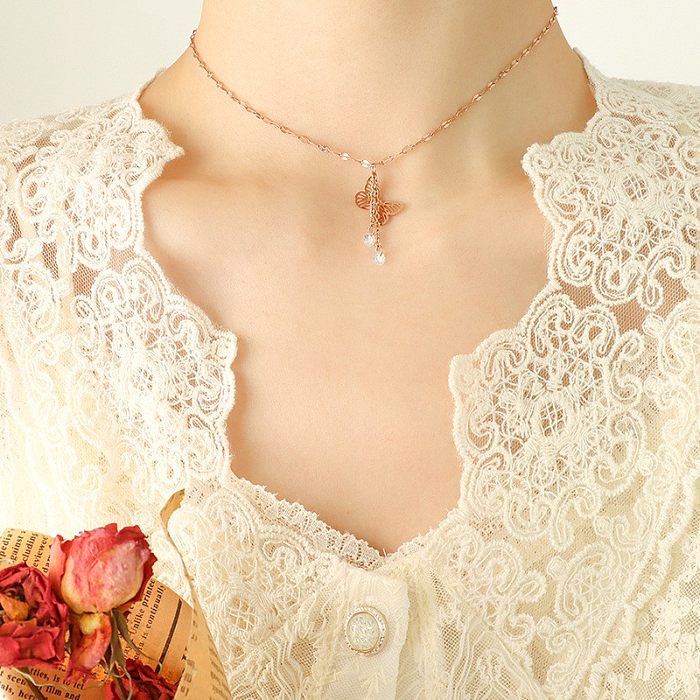 Mode doux artistique papillon gland Zircon pendentif en acier inoxydable collier femme