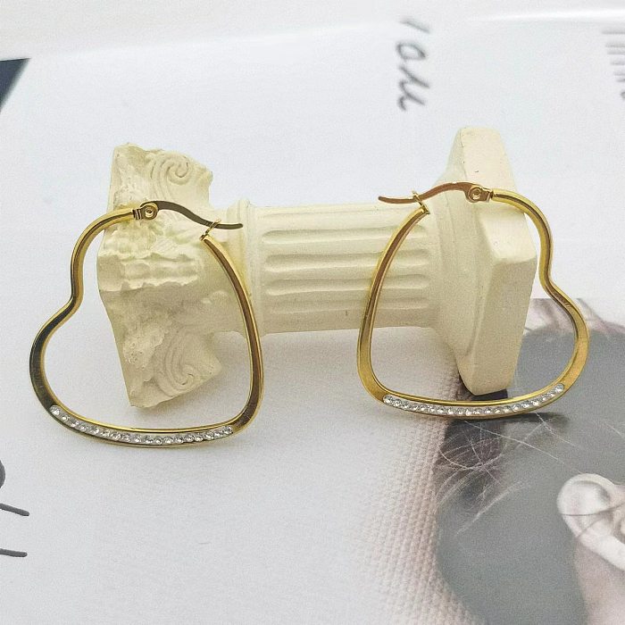 1 paire de boucles d'oreilles en forme de cœur de Style moderne, incrustation de placage en acier inoxydable, diamant artificiel