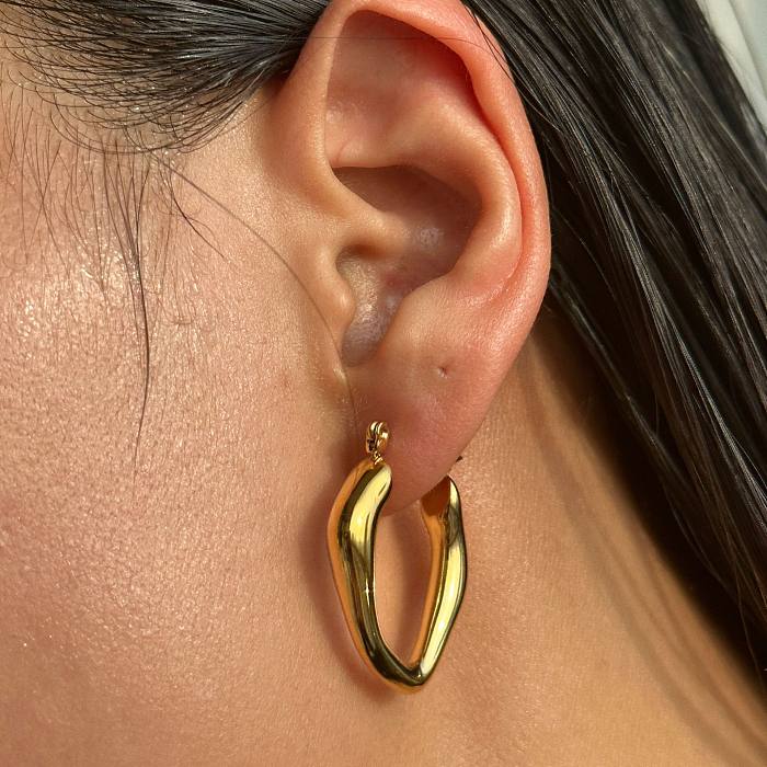 1 paire de boucles d'oreilles créoles irrégulières en acier inoxydable, streetwear