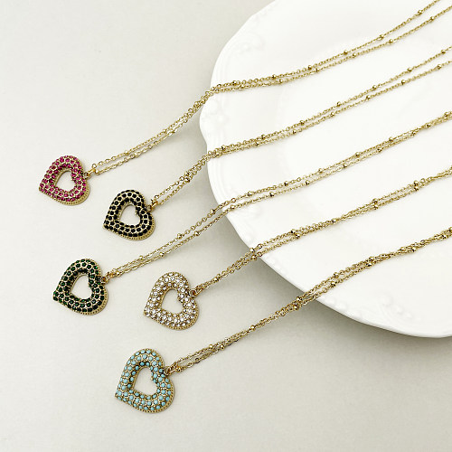 Glamouröse, romantische Halskette mit Anhänger in Herzform, Edelstahl, vergoldet, mit Strasssteinen, in großen Mengen