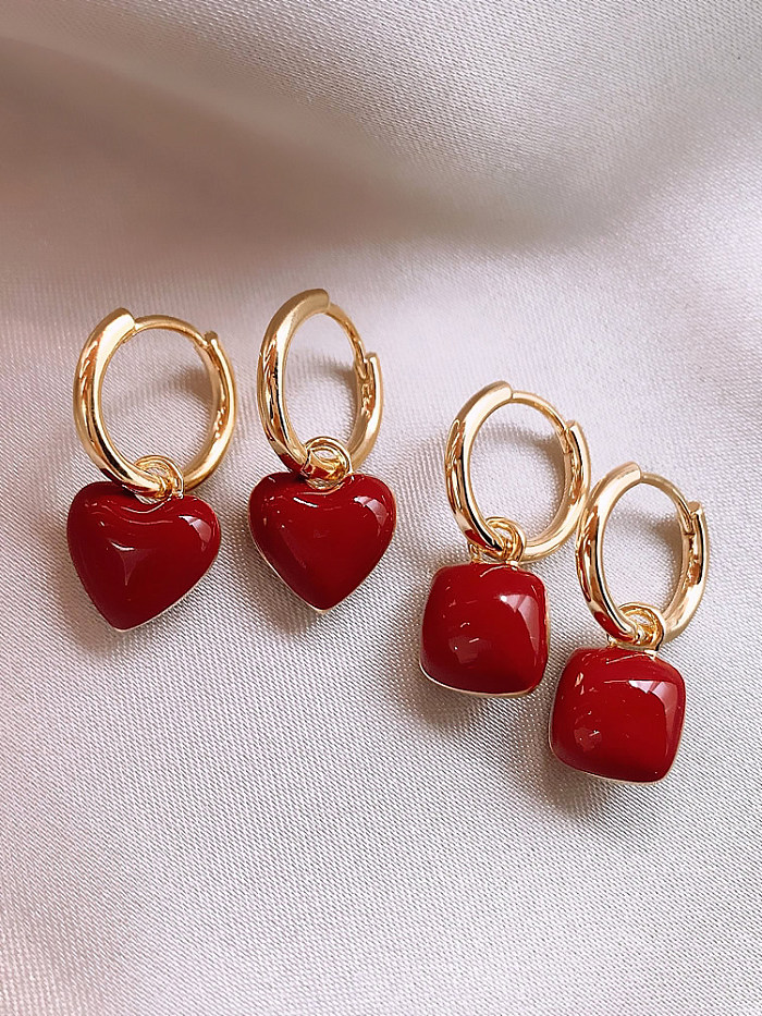1 par de pendientes chapados en oro y cobre de acero inoxidable chapados en forma de corazón, románticos y elegantes