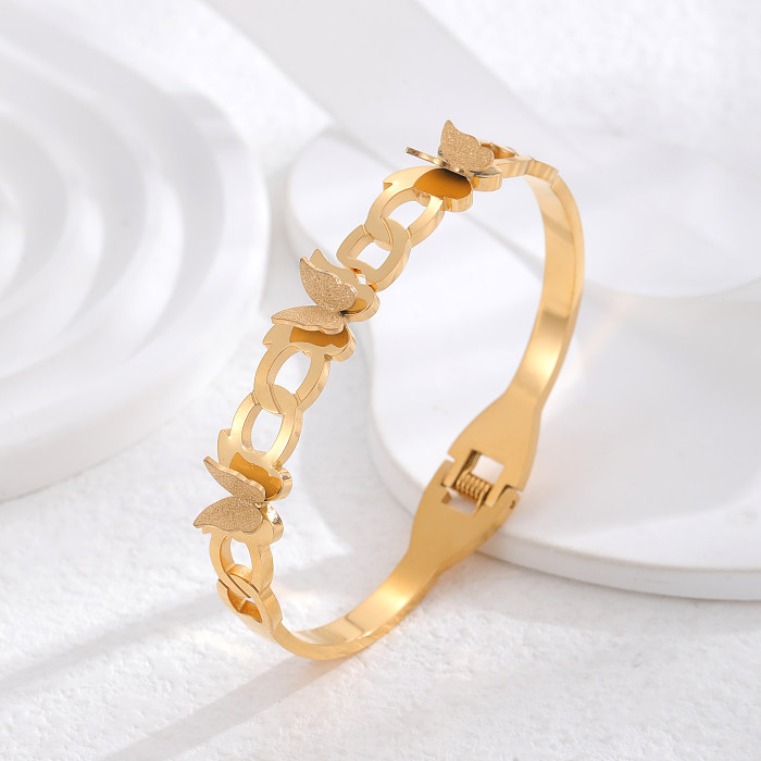 Bracelet plaqué or 24 carats en acier titane papillon de style classique en gros