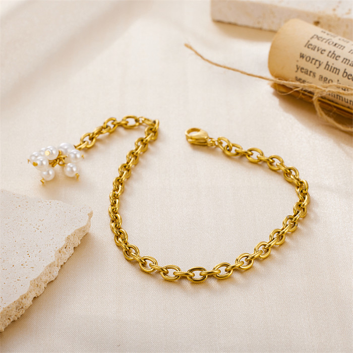 Venta al por mayor Pulseras chapadas en oro de 18 quilates con revestimiento de perlas de agua dulce de acero inoxidable con flores de estilo simple