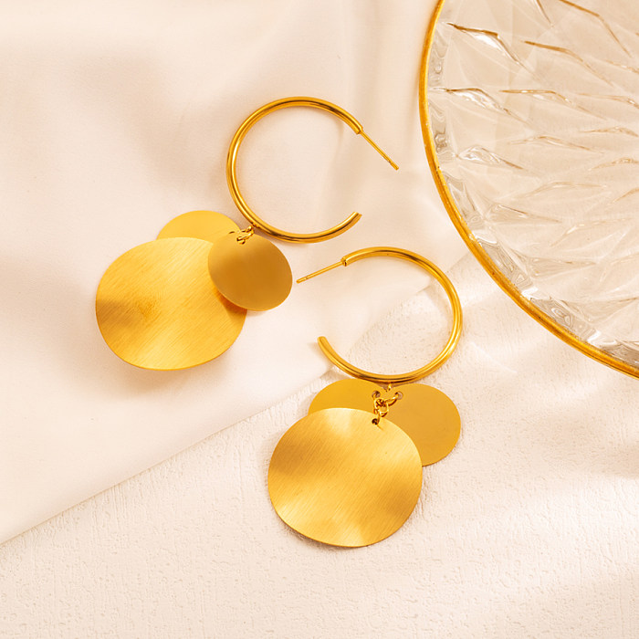 1 par de pendientes colgantes chapados en oro de 18 quilates con diseño de rombo y círculo elegante
