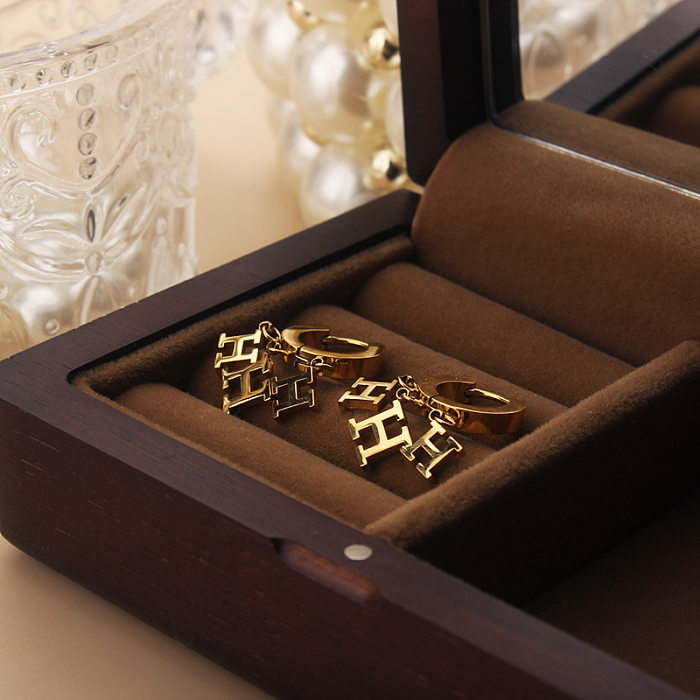 1 par de pendientes colgantes chapados en oro de acero inoxidable chapado en letras de estilo simple