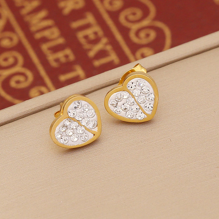 Pendientes de diamantes de imitación chapados en acero inoxidable con mariposa en forma de corazón a la moda, 1 par