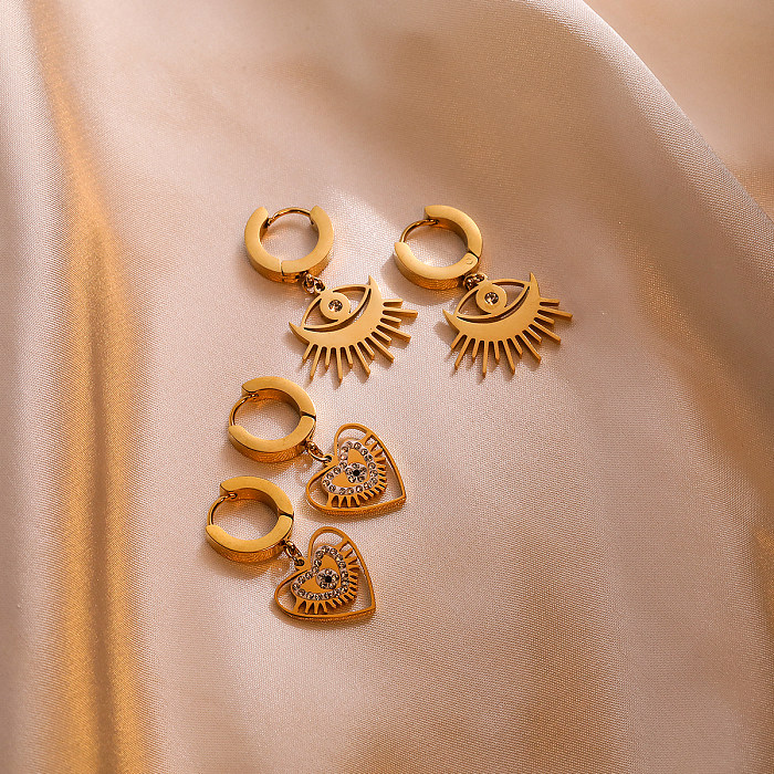1 par de pendientes colgantes chapados en oro de 18K con incrustaciones de ojo del diablo de estilo Simple y circonita de acero inoxidable