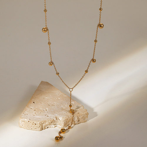 Neue Halskette aus 18 Karat vergoldetem Edelstahl mit runden Perlen und Quasten
