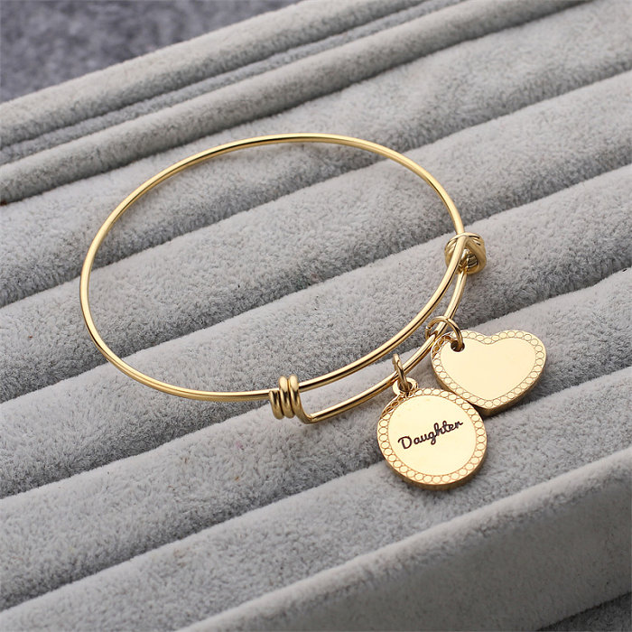 Brazalete chapado en oro de acero inoxidable con forma de corazón y letra redonda de estilo simple y clásico a granel