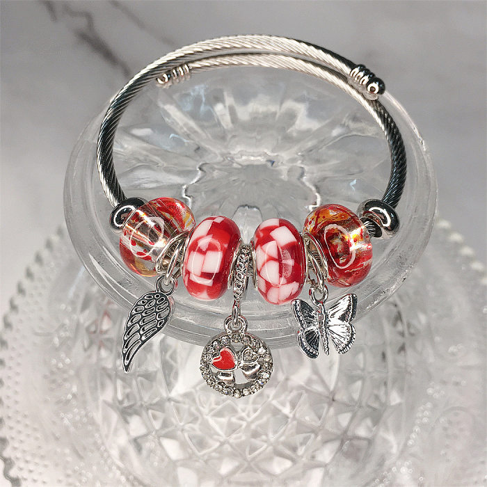 Brazalete de piedras preciosas artificiales de resina de aleación de acero inoxidable de señora Butterfly a granel