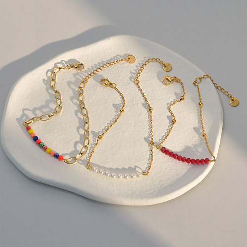 Elegante geometrische Edelstahl-Inlay-Kunstperlen-Perlen-Armbänder