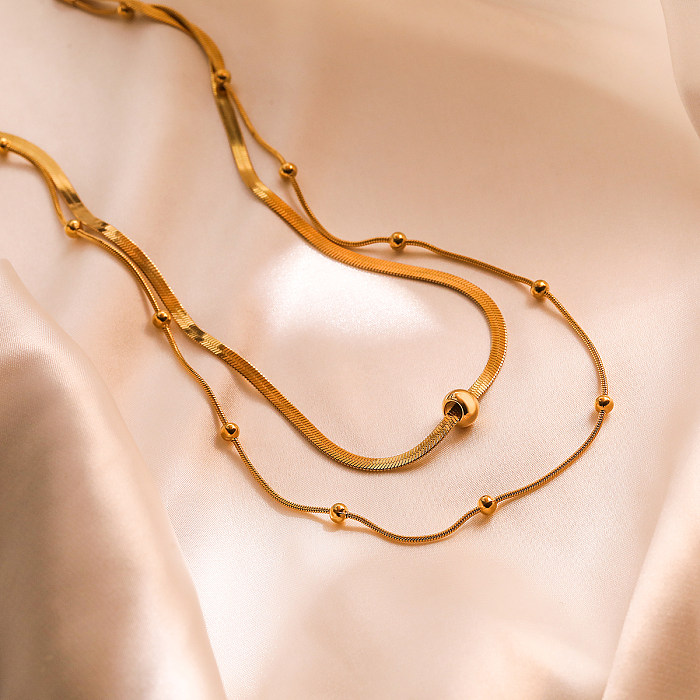 Mehrschichtige Halsketten im schlichten Stil für Pendler mit einfarbiger Edelstahlbeschichtung und 18-Karat-Vergoldung