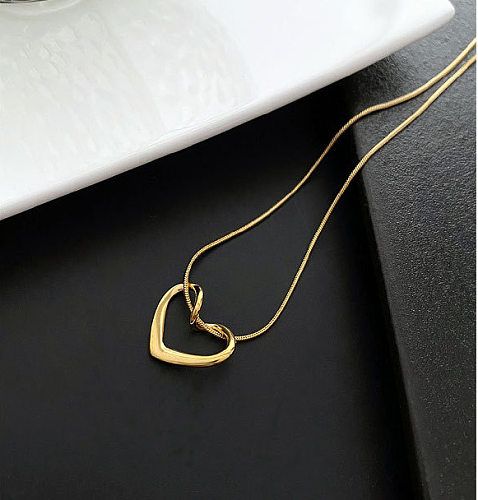 Colar com pingente de ouro incrustado em aço inoxidável em formato de coração da moda 1 peça