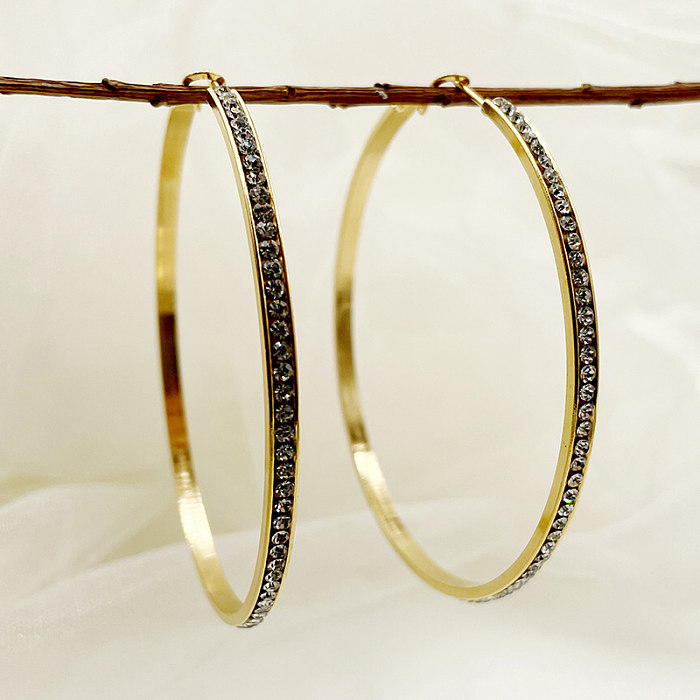 1 par de pendientes de aro chapados en oro con circonitas de acero inoxidable con incrustaciones circulares de estilo sencillo y dulce Rock