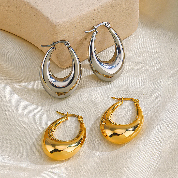 1 paire de boucles d'oreilles ovales en acier inoxydable plaqué or 18 carats, style simple