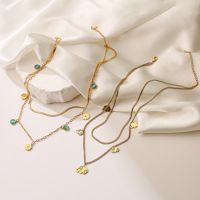 Einfache Pendel-Halskette mit rundem Anhänger aus Edelstahl mit Inlay und 18-Karat-Vergoldung in Türkis