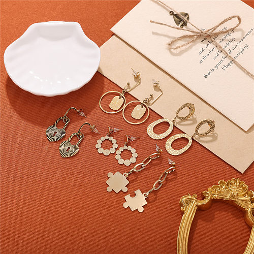 1 paire de boucles d'oreilles pendantes élégantes et luxueuses en forme de cœur en acier inoxydable plaqué or 18 carats