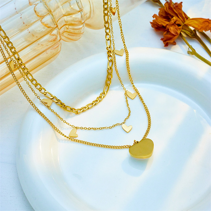 Colares em camadas banhados a ouro 18K com revestimento de aço inoxidável em forma de coração estilo simples