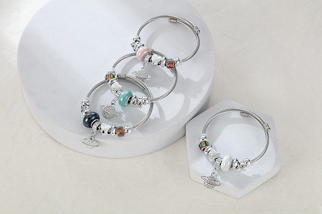Bracelet plaqué argent de Zircon d'incrustation de placage d'acier inoxydable de planète de forme de coeur de style moderne