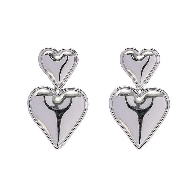 1 par de elegantes pendientes colgantes de acero inoxidable con forma de corazón dulce
