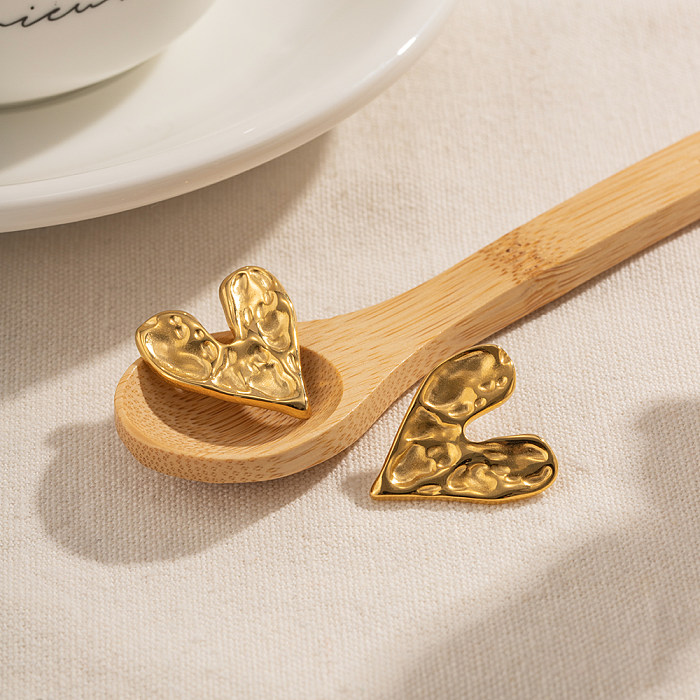 1 par de pendientes chapados en oro de 18 quilates de acero inoxidable chapado en forma de corazón estilo Simple estilo IG