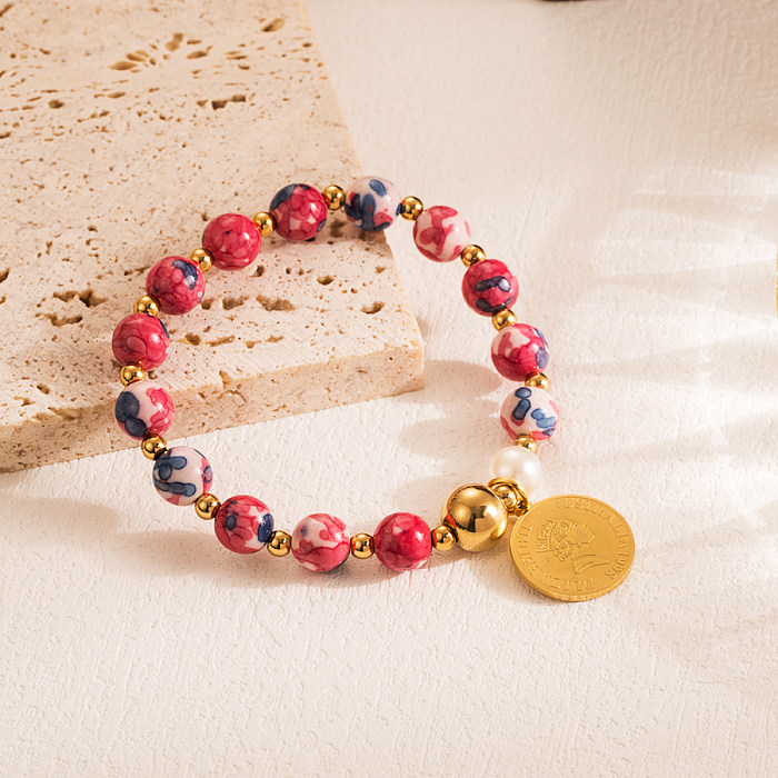 INS-Stil Kreuz Teufelsauge Feder Edelstahl Nachahmung Perle Synthetik Perlen vergoldet Armbänder