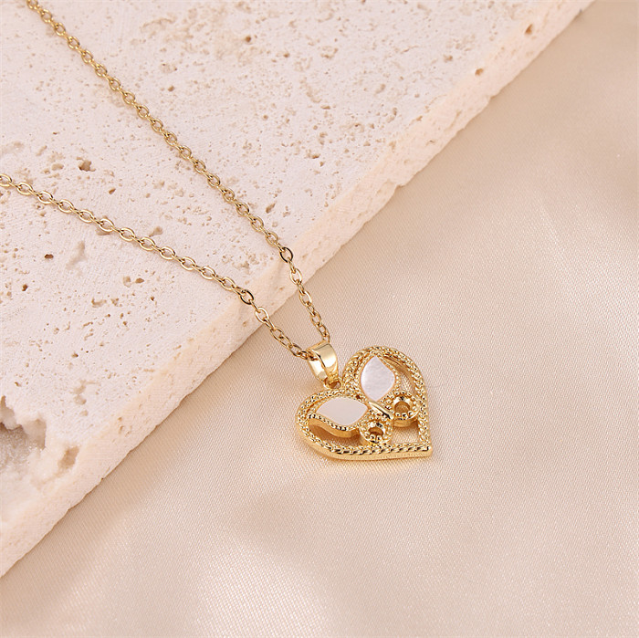 Collier pendentif plaqué or 18 carats en acier inoxydable avec papillon en forme de cœur de style simple et romantique